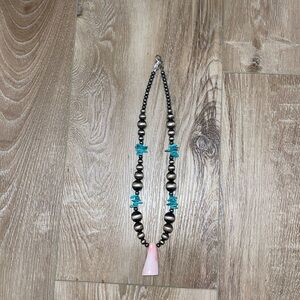 Navajo Pearl necklace with turquoise, and pink conch.